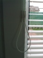 žaluzie PRIM detail uchycení řetízku